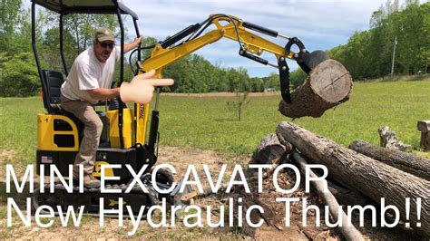 compact excavator thumb|installing thumb on mini excavator.